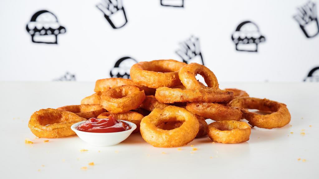 Onion Rings · Thick onion rings battered & fried to perfection