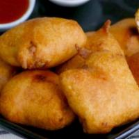 Paneer Pakoras · Marinated paneer (Indian cheese) dipped in a batter and fried making a crispy, mouthwatering...