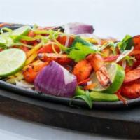Tandoori Chicken-Half · Two pieces of Tandoori Chicken marinated in yogurt and Indian spices then roasted in a hot t...