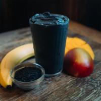 Charcoal Coconut Smoothie · Mango*, banana*, activated charcoal*, coconut water*, sesame seeds*, *organic