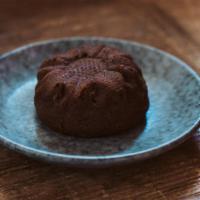 Chocolate Mochi Bun (GF, V) · Sweetened with coconut sugar, featuring organic raw cacao