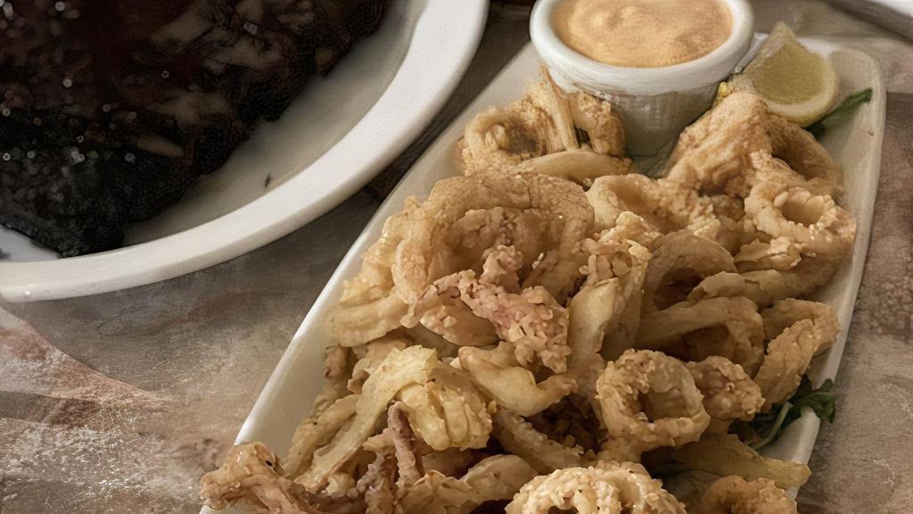Calamari Medley · Lightly battered and flash fried served with fennel and remoulade.