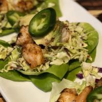 Spicy Shrimp & Avocado Lettuce Wraps · Gluten-free. Served with honey-lime sauce.