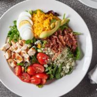 Classic Cobb Salad · Bacon, chicken breast, farm fresh egg, avocado, tomato, blue and cheddar cheese, choice of d...