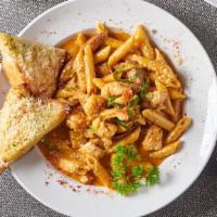 Cajun Penne Pasta · Andouille sausage, prawns, and tender chicken in a creole cream sauce.