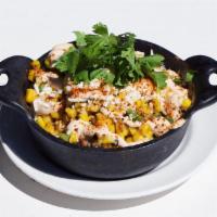 Mexican Street Corn off the Cob · grilled sweet corn, cilantro, jalapeño, lime, cotija cheese, chipotle crema