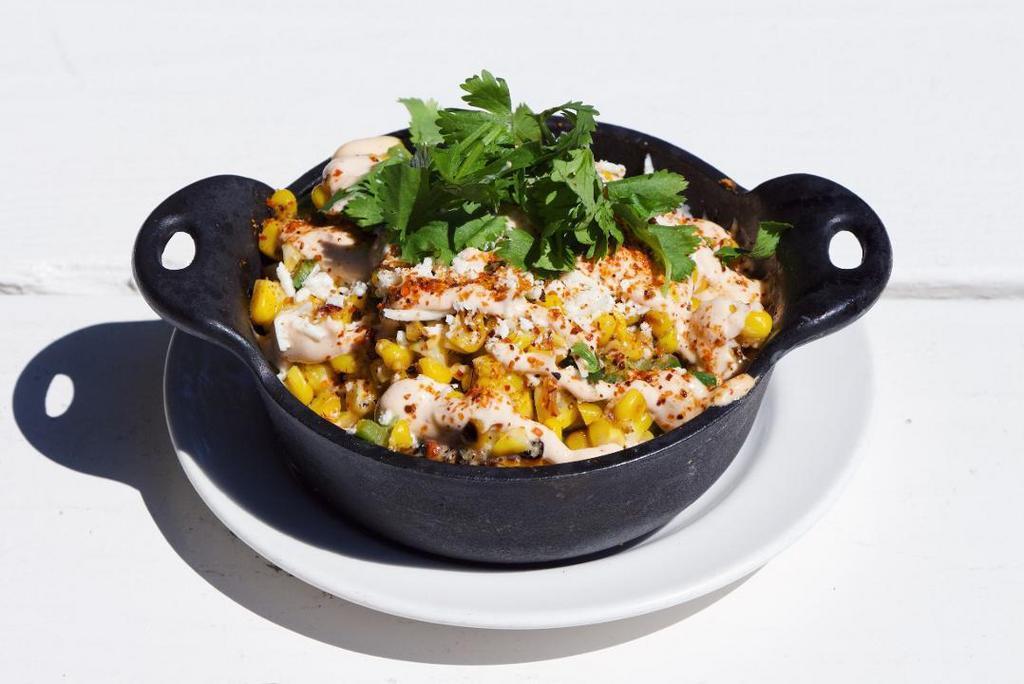 Mexican Street Corn off the Cob · grilled sweet corn, cilantro, jalapeño, lime, cotija cheese, chipotle crema