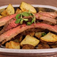 Flank Steak with Roasted Potatoes · Marinated flank steak with herb roasted potatoes. Served cold in a microwavable container. R...