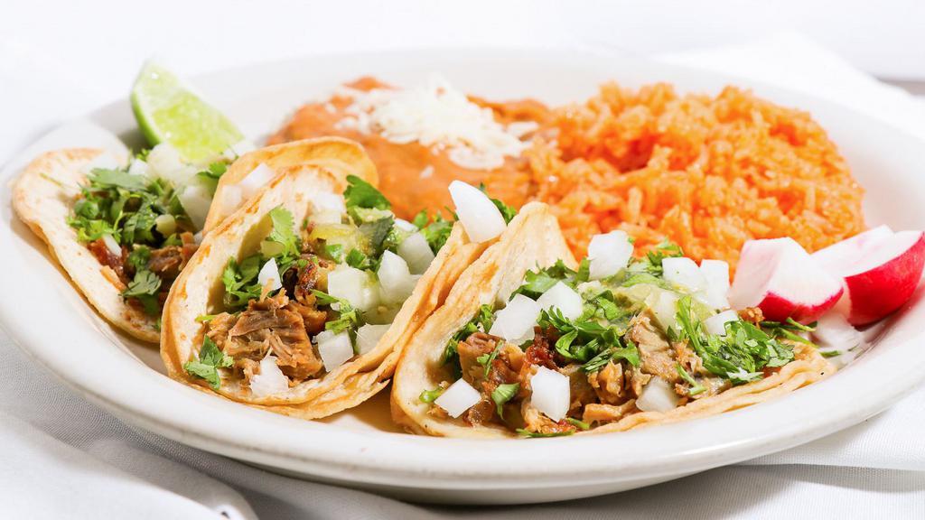 Soft Taco Mex · Grilled chicken, asada, pastro or carnitas & topped with onions, cilantro & green salsa.