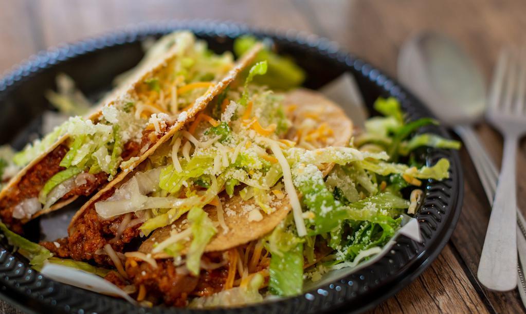 Crispy Tacos · Chicken or ground beef w/ lettuce, cheese, tomato.