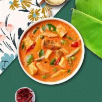 Red Buffed Curry · Red curry sauce and coconut milk with tofu, eggplants or bamboo shoots, bell peppers, and sw...