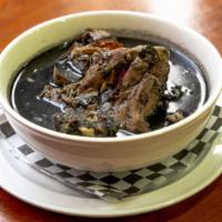 RELLENO NEGRO (CHICKEN)  · Black chili chicken soup, chillies are toasted and made  into a black chili paste in Yucatan...