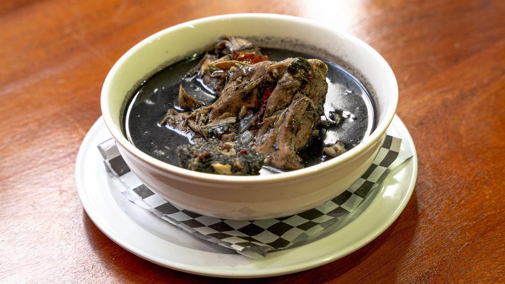 RELLENO NEGRO (CHICKEN)  · Black chili chicken soup, chillies are toasted and made  into a black chili paste in Yucatan, this soup is perfect for spicy lovers. served with a  boiled  egg and pork meatball ( mayan Classic)