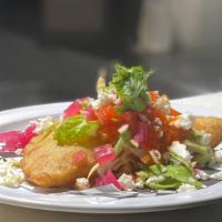 MIXED EMPANADA  · Empanada mixed with ground pork and cheese, topped with cabbage, pickled red onions, tomato ...