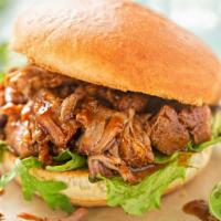 Torta Asada (Steak) · A delicious sandwich made with Mexican bread and filled with Steak, beans, salsa, avocado, a...
