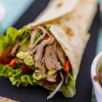 Super Carnitas (Pulled Pork) Burrito · A mouthwatering Super Burrito made with a Flour tortilla and filled with Pulled Pork, rice, ...