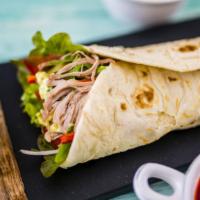 Spicy Super Carnitas (Pulled Pork) Burrito · A mouthwatering spicy Super Burrito made with a Flour tortilla and filled with Pulled Pork, ...