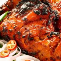 Tandoori Chicken (Full) · Chicken Marinated in indian Sauce & Mild Spice