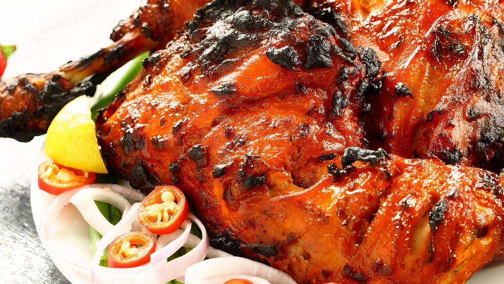 Tandoori Chicken ( Half ) · Chicken marinated in mint sauce & mild spice.