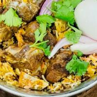 Gongura Goat Biryani · Goat cubes cooked in tangy and spicy Andhra style gongura (Sorrel) leaves sauce served with ...
