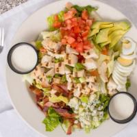 Mels Cobb Salad · Lettuce, chopped bacon, diced chicken, avocado, green onions, egg, tomato, and bleu cheese c...