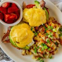 California Benedict · Grilled English muffin halves topped with three strips of bacon, grilled tomato slices, avoc...
