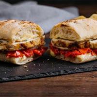 Grilled Cage Free Chicken Sandwich · herb marinated, antibiotic & hormone free, never frozen chicken, slow roasted tomatoes & ora...