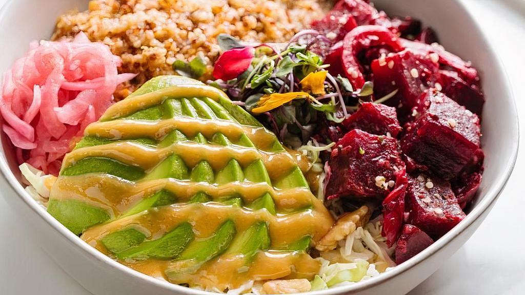 Beets + Avocado Plant Based Bowl · organic red and white quinoa, roasted beets, avocado, raw walnuts, pickled red onions, hemp seeds, shaved cabbage, miso lemongrass dressing