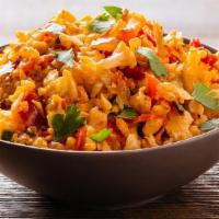 Cauliflower & Vegetable Rice · riced cauliflower sauteed with red bell pepper, red onion, slow roasted tomato, harissa sauc...