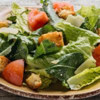 Side Caesar Salad · hand cut organic romaine and organic whole baby kale leaves tossed with diced organic tomato...