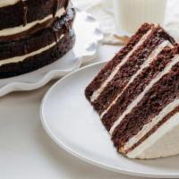 Chocolate Vanilla Layer Cake · chocolate cake layers filled with vanilla bean cream, scratch made chocolate ganache, finish...