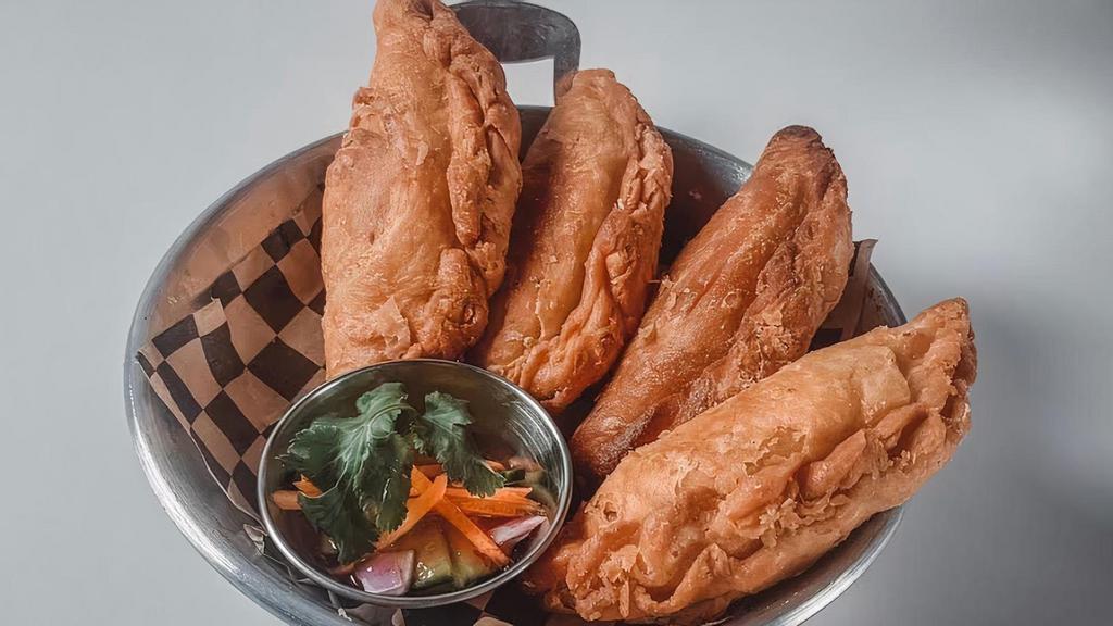 Samosa · Most Popular. Curry puff stuffed with potato serve with curry sauce. (4).