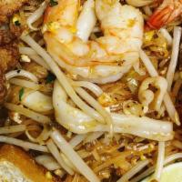 Pad Thai · Most Popular. Classic Thai famous stir-fried rice noodle in sweet - sour tamarind sauce with...
