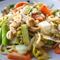 The Udon · Stir-fried Udon noodle with asparagus, mushroom, carrot, onion, cabbage in sesame soy sauce.