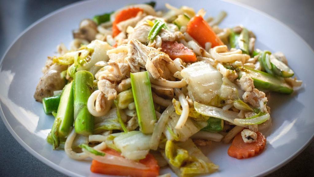 The Udon · Stir-fried Udon noodle with asparagus, mushroom, carrot, onion, cabbage in sesame soy sauce.