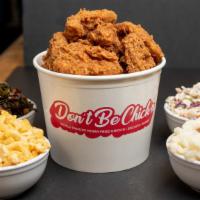 Cluckin' Bucket Family Meal · 9 piece bucket of our world famous vegan fried chick'n, two 16 oz sides of your choice, Caju...