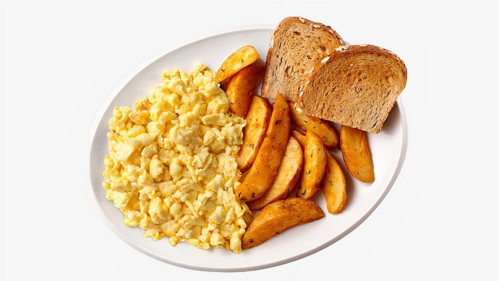Egg Platter · Two scrambled eggs with two slices of buttered toast and home fries.