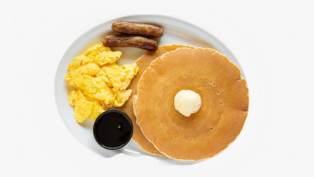 Pancake Combo · Two scrambled eggs, three fluffy pancakes, and your choice of meat served with syrup on the side.