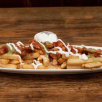 Fries Chicken Little  · Grilled or Shredded Chicken. Fries, cheese, onions, cilantro, sour cream, and salsa.