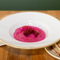 Beet Hummus · Gluten free, vegetarian. Hummus with roasted beets. Served with pita bread.