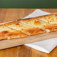 Cheese Pide · Akawi and mozzarella with herbs.