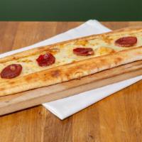 Beef Sujuk Pide · Cured beef, akawi and mozzarella with herbs.