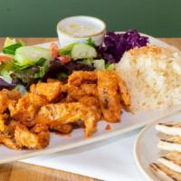 Chicken Gyros Plate · Slow cooked, thinly sliced, marinated chicken. Served with rice, salad and pita bread.