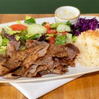 Lamb & Beef Gyros Plate · Slow cooked, thinly sliced, marinated lamb and beef. Served with rice, salad and pita bread.