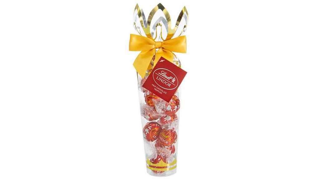 Delicious Chocolate Truffles · Each tower contains 12 luxurious Lindt® Lindor® truffles. Tube is filled with 12 Milk Lindor® truffles and completed with an elegant satin bow. A chocolate a day keeps the stress away! Lindor® chocolates are always a crowd pleaser! When you break its shell, Lindor® starts to melt and so will you. Lindt® chocolate embodies the passion and expert craftsmanship of its Lindt® Master Swiss Chocolatiers. Lindt® delivers a unique chocolate experience offering a distinctly smooth and rich, gourmet taste.
