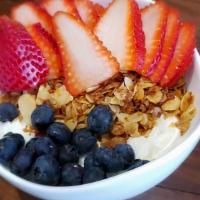 Granola-Yogurt-Fruit-Parfait · Plain Greek yogurt infused with honey and vanilla bean, topped with housemate granola, and f...