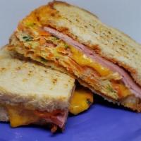 Korean Omelette Toast · buttered toast with an eggs, shredded cabbage, carrots, and green onions folded into an omel...