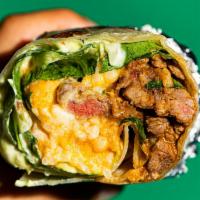 El Rico Burrito · Classic, marinated beef/chicken burrito with refried beans, Monterrey Jack cheese, sour crea...