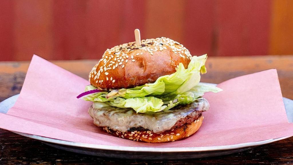 Single Best Damn Grass Fed Cheeseburger · House specialty! Quarter pound grass fed beef patty with lettuce, onion, gruyere, and secret sauce on a buttery, griddled sesame, and scallion bun.  Our burgers are prepared medium rare (if you want it with no-pink, select well done)
