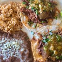 Taco Plate (1 Taco) · One regular taco plus rice and beans.